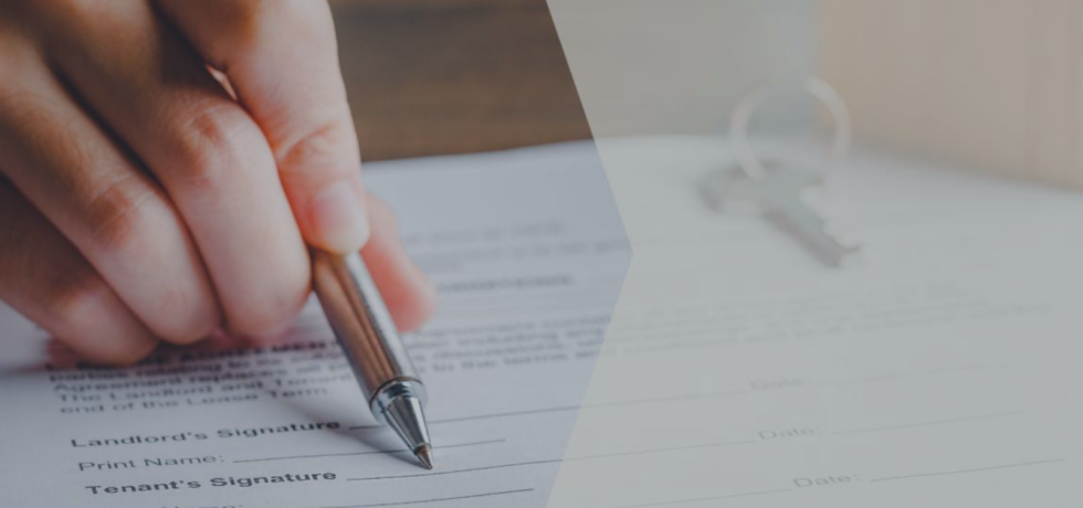 Image of landlord and tenant paperwork