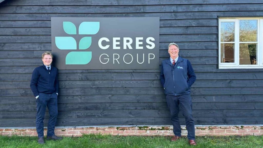 Image of Harry & Guy in front of ceres group logo
