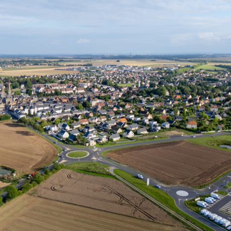 Image if farmland, housing, and businesses